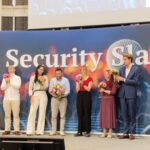 Forschung auf der Bühne: Wissenschaftler der HSU/UniBw H gewinnt Security Slam 2026